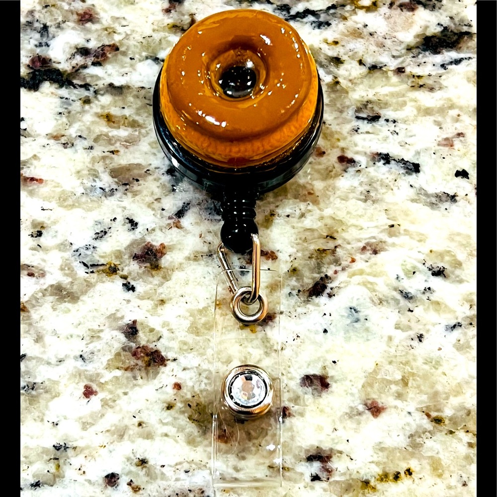 Chocolate donut badge reel, badge pull.